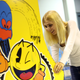 Visitor Alina Ullrich plays a vintage Pac-Man video game at the Making Games conference during International Games Week on April 26, 2017 in Berlin, Germany.